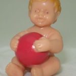 miniatures baby girl with ball