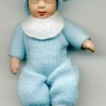 miniatures baby boy in woollen romper