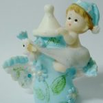 miniatures boy on bottle w/swan