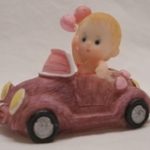 miniatures girl inside car