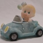 miniatures boy inside car