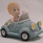 miniatures boy inside car