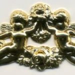 finding gold plated filigree cherub scroll large
