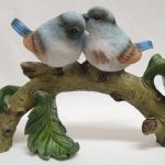 blue bird on branch